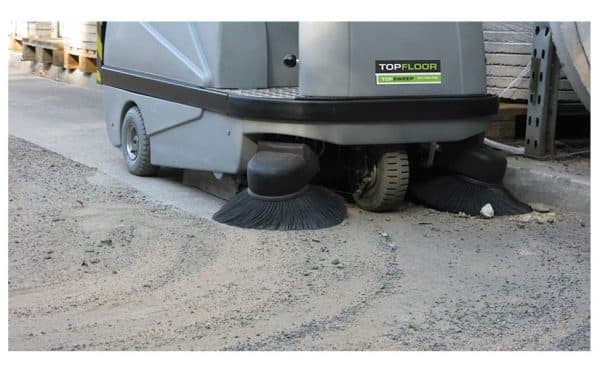 TF110R TRS TOPFLOOR Ride On Battery Powered Sweeper 3 sweeping dust small stones in Aggregate building yard